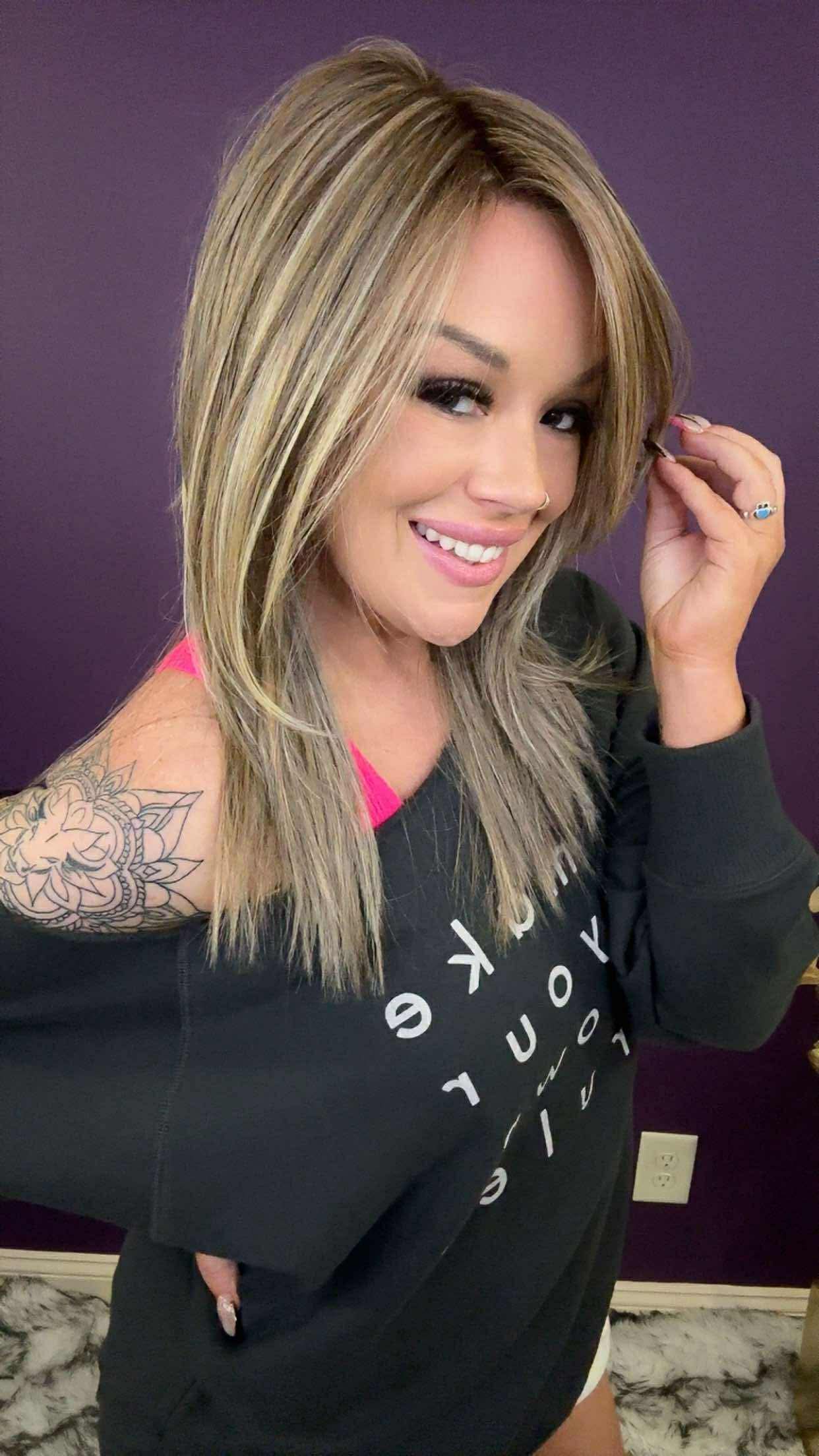 Blake in Truffle Mocha Cream – medium-length neutral blonde wig with mocha undertones.
Blake by Chic Lifestyle features soft amber tones on a rich chocolate brown base, crafted with a Diamond Collection cap for airy, natural styling and everyday comfort.